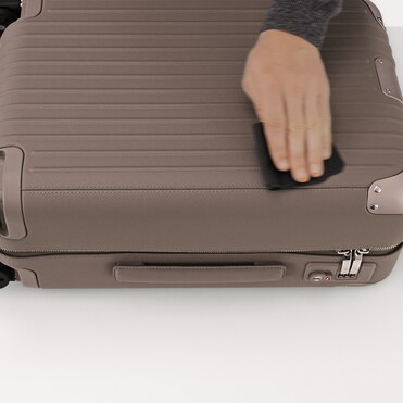 Remove dust and dirt from your leather suitcase