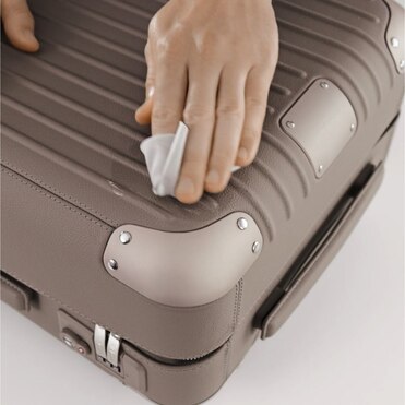 Cleanse and nourish the leather of your RIMOWA suitcase