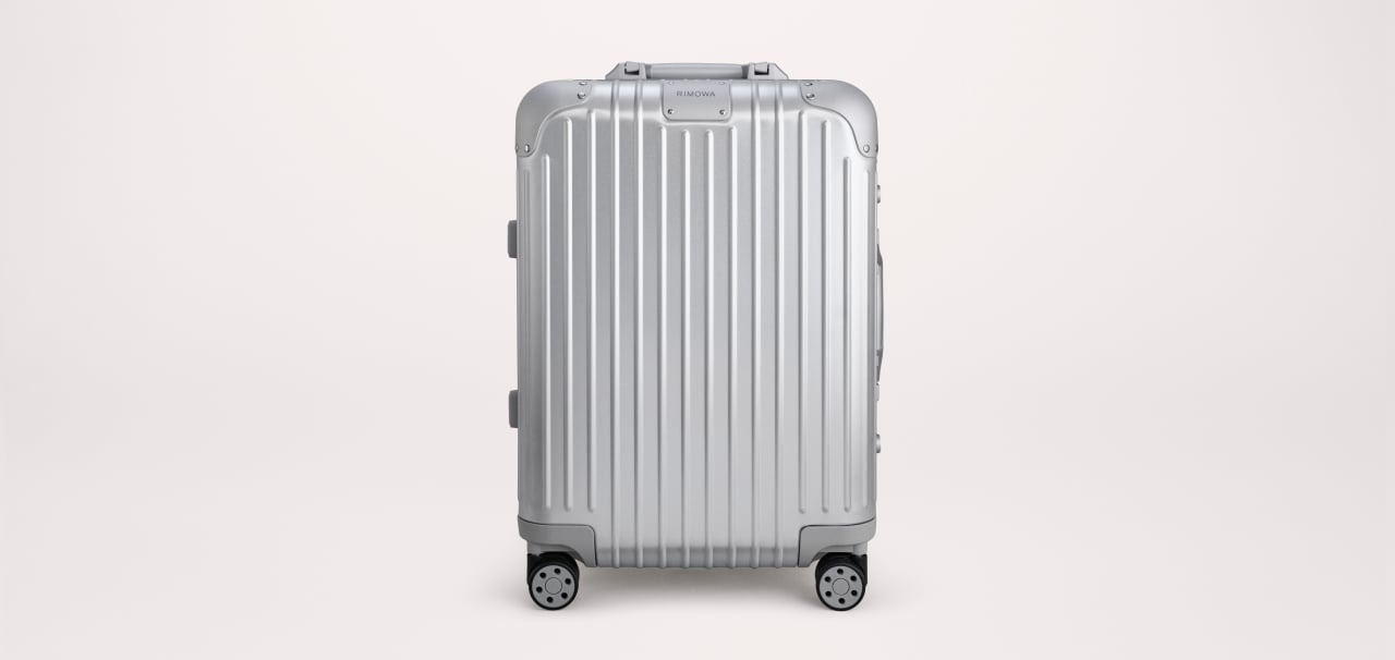 Une valise Original Cabin silver qui porte l'empreinte du temps