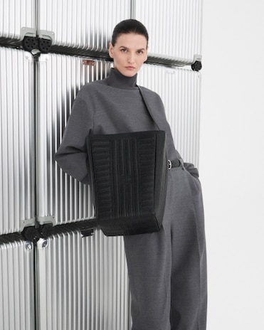Ideal for everyday wear, the RIMOWA's Groove Hobo Bag is a designer hobo bag with sleek lines and RIMOWA's iconic patterns