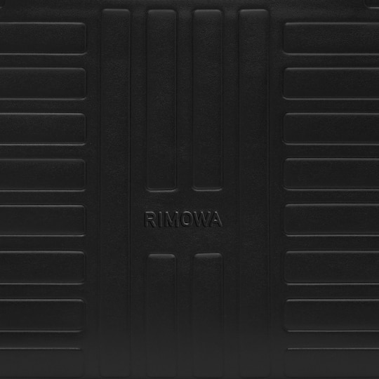 RIMOWA's Groove Bags feature our plate signature.