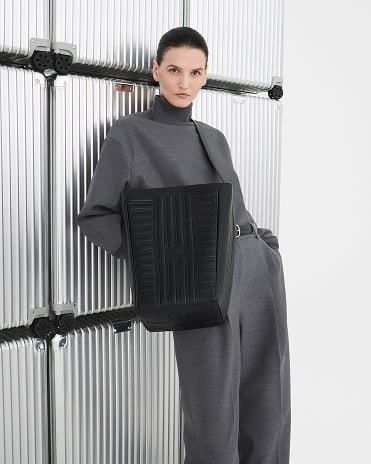 Ideal for everyday wear, the RIMOWA's Groove Hobo Bag is a designer hobo bag with sleek lines and RIMOWA's iconic patterns