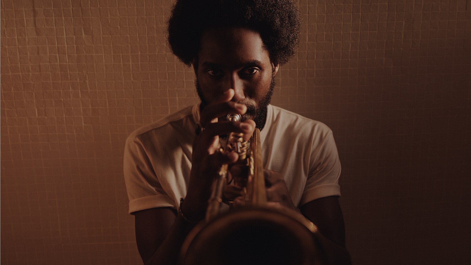 Picture of a man playing the trumpet