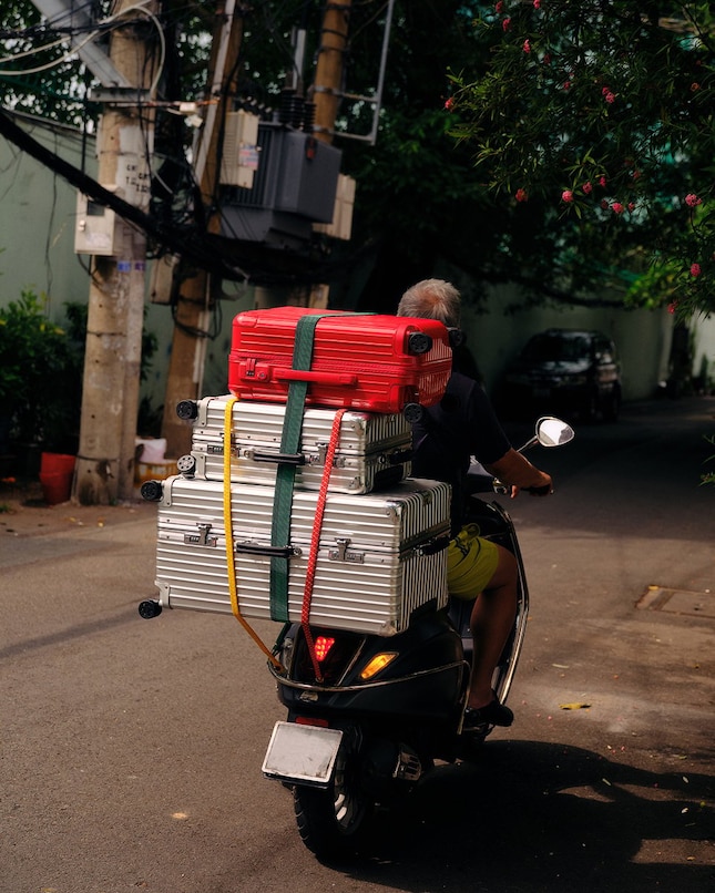 Photo of suitcases and factory