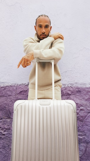 Lewis Hamilton with an Original Check-In M suitcase in silver
