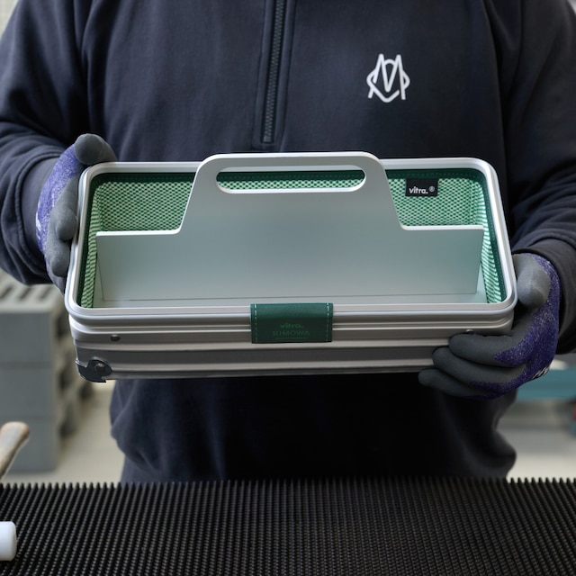 Picture of a factory employee holding the Toolbox Picture of a factory employee holding the Toolbox