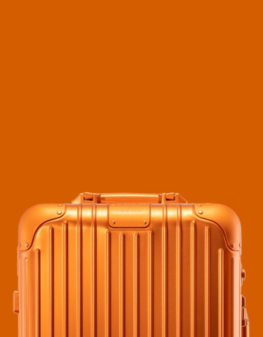 orange carry on luggage
