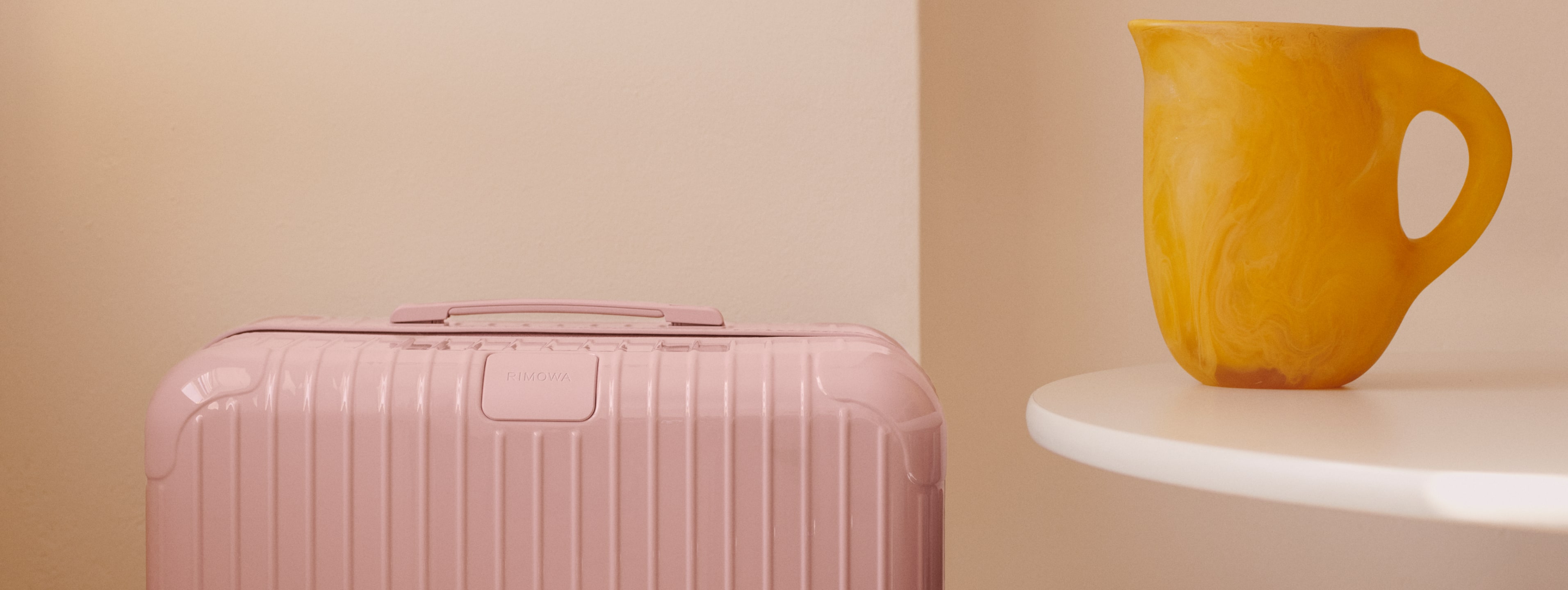 rimowa pink luggage