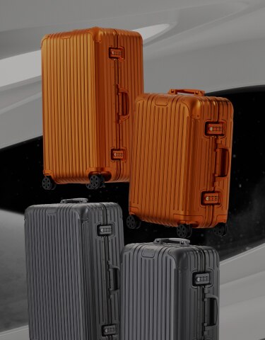 rimowa orange luggage