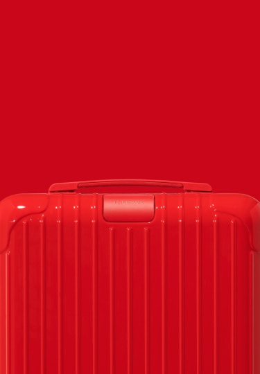 red rimowa luggage